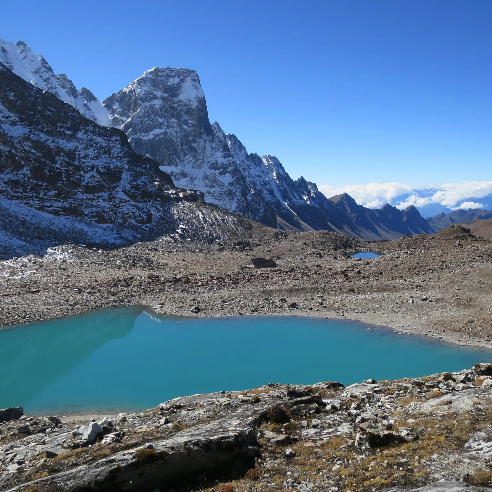 A turquoise glacial lake on the high route